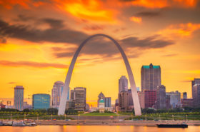 St. Louis skyline view including the Gateway Arch, courthouse, and Mississippi River